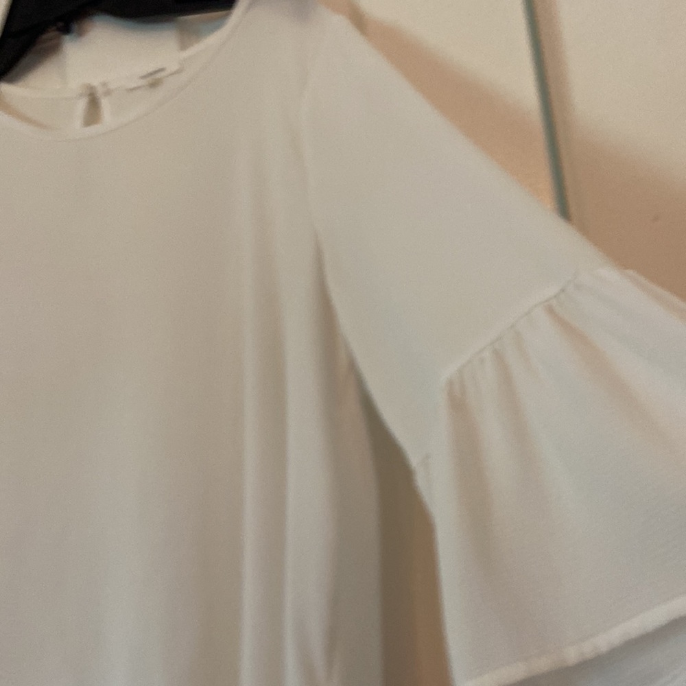 Cream blouse with flounce on sleeves and hem - Picture 3 of 5